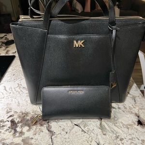 Used like new Michael Kors purse and large wallet